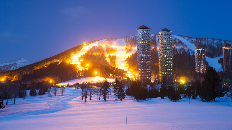 Night-time skiing and snowboarding